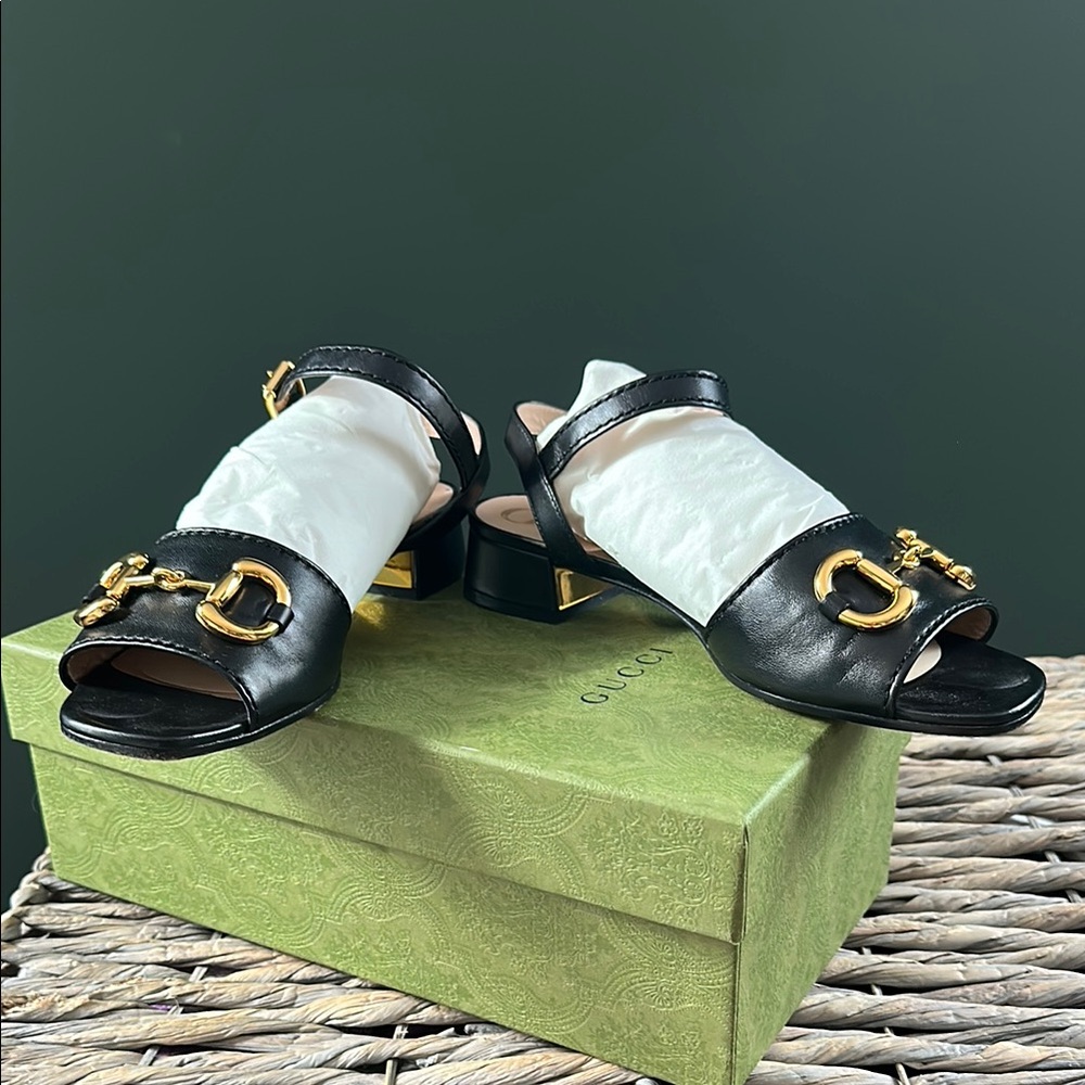 Gucci Black Leather Sandals with Gold Accents